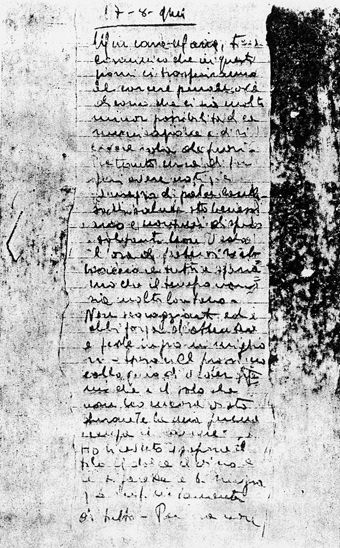 L’immagine riproduce la fotocopia cartacea della prima facciata dell’ultima lettera di Flavio Busonera alla moglie Maria, scritta il giorno stesso della sua esecuzione. L’originale è scritto sulle due facciate di un foglio a righe lungo e stretto.