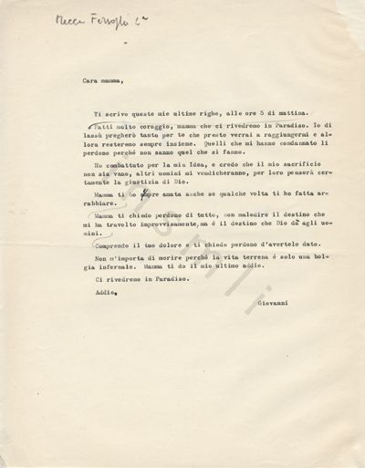 L’immagine riproduce la trascrizione a macchina dell’ultima lettera di giovanni Mecca Ferroglia alla madre. Nel documento vi sono alcuni segni o correzioni tracciati a mano, in penna nera o matita. In alto, sempre in matita, c’è il cognome del condannato con un numero "2ª".