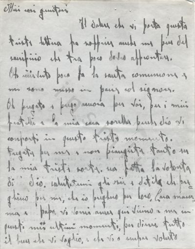 L’immagine riproduce la copia fotografica della prima facciata della lettera di Mario Bruno Corti ai genitori, scritta poche ore prima dell’esecuzione.